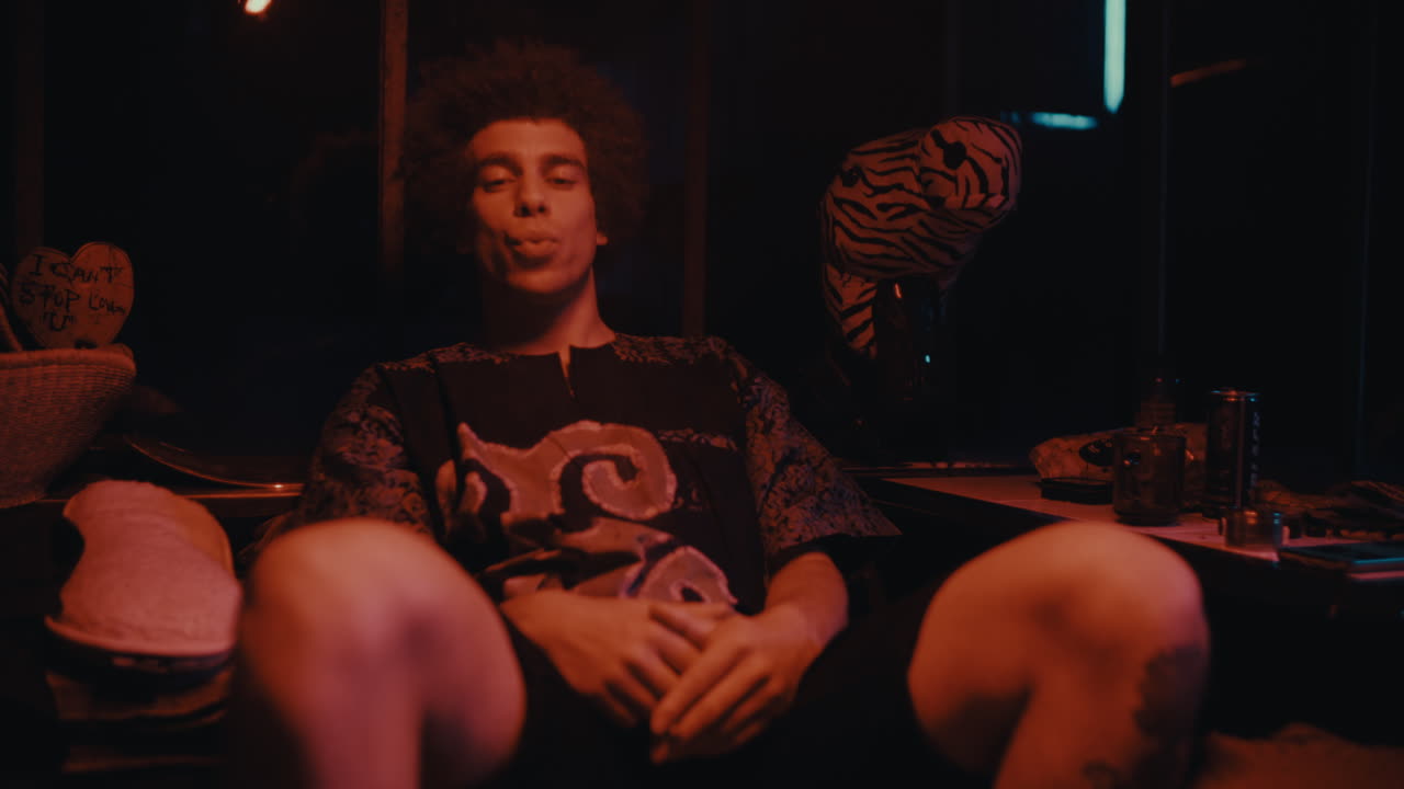 A Relaxed Man in a Dark Room