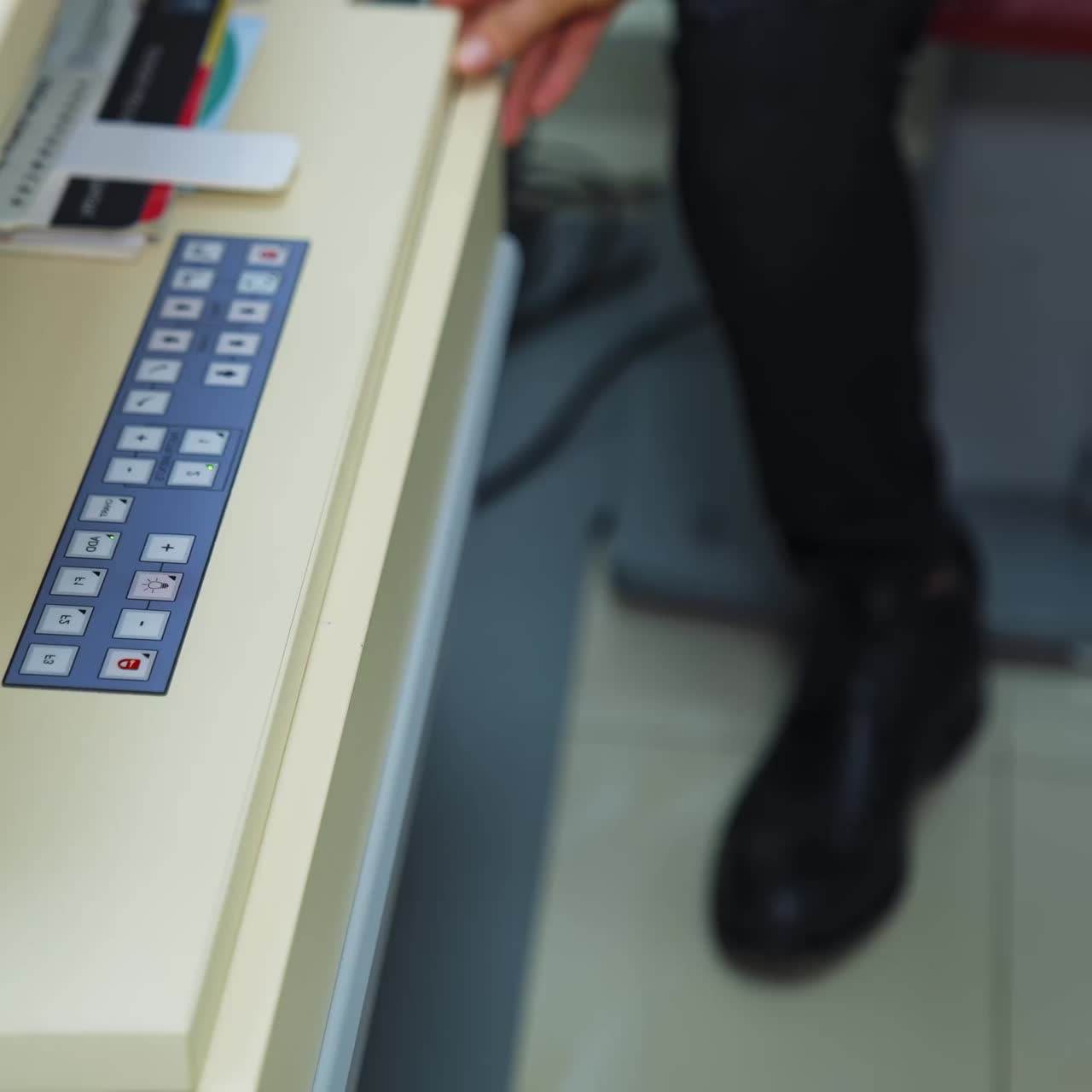 Glasses accessories in optometrist's office. Doctor opens the drawer and takes trial frame with lenses. Optical instruments in clinic. Ophthalmology concept