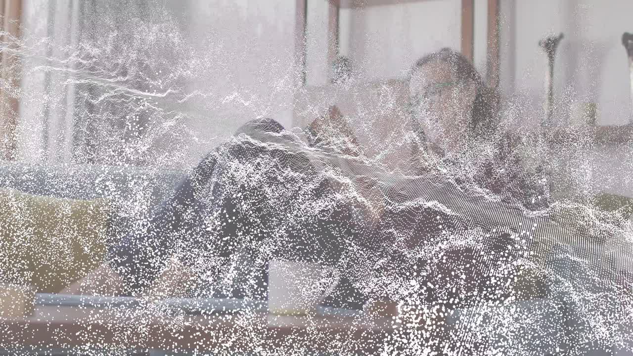 Woman reclining on sofa tapping device screen scrolling tech news with animated icons floating