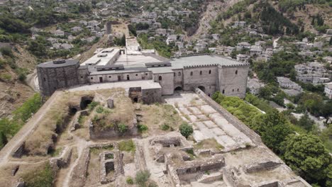 orbiting view of gjirokaster castle, stone ruins of the old citadel, albania heritage