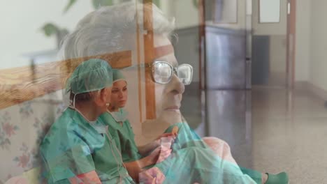 animation of senior woman over doctors wearing protective face masks in a hospital. covid 19 spreadi