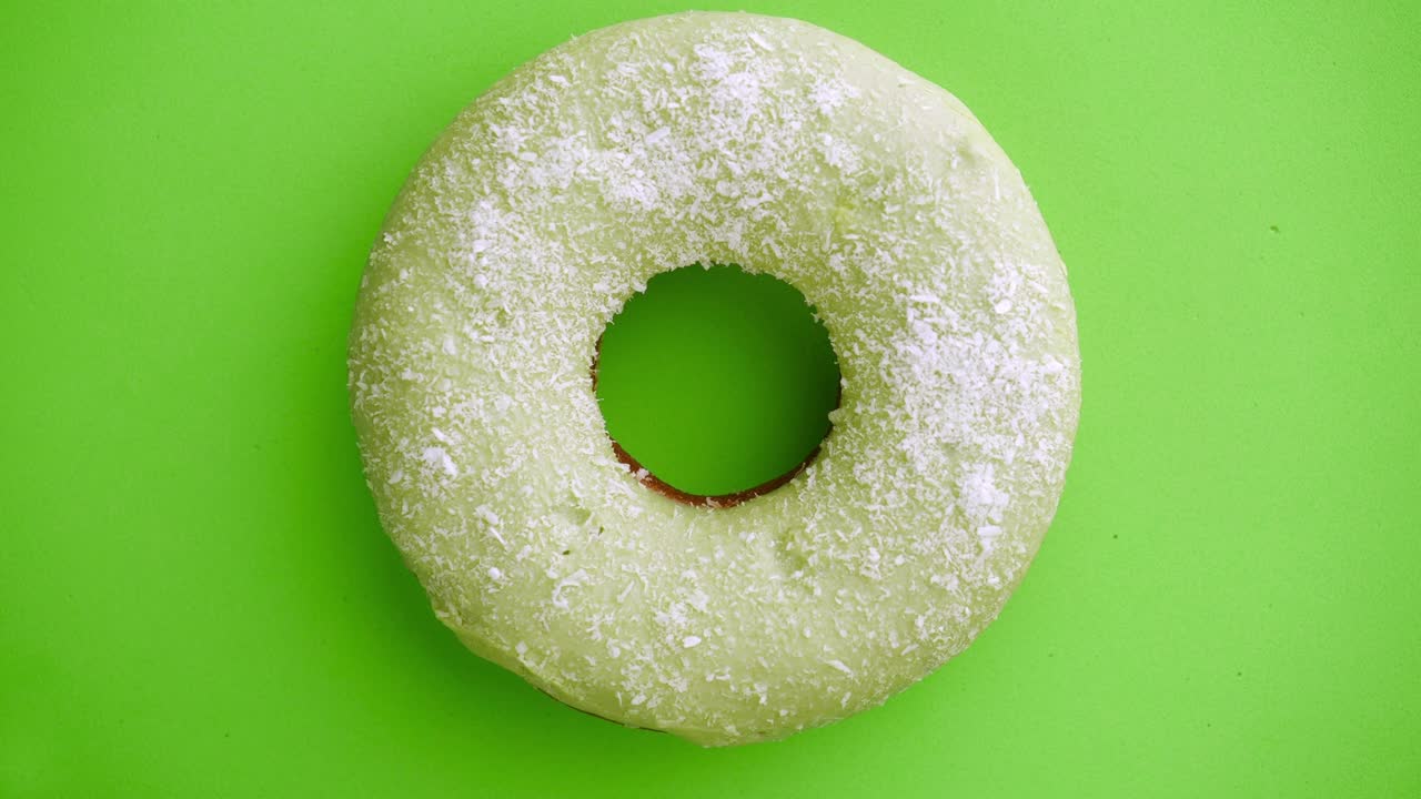 el donut está vidriado de cerca, con un bucle sin costuras.