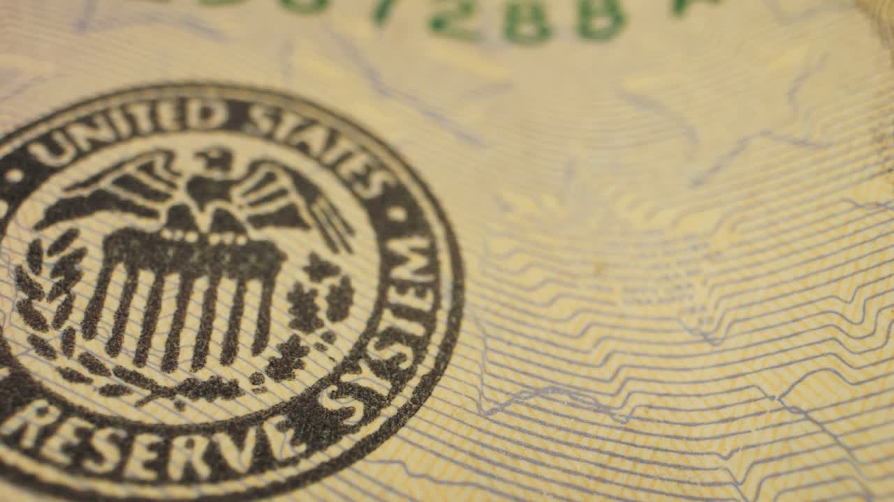 Five dollars banknotes close-up. American currency USD Central Bank. 5 dollar money macro. Economy, financial and banking concept in European union.