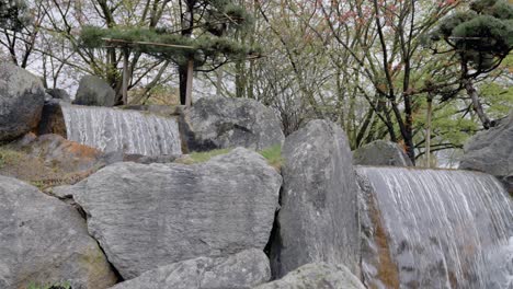 Japanese-waterfall-at-the-biggest-Japanese-garden-of-Europe-in-Hasselt,-Belgium