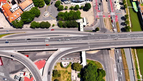system of roads in the modern city. drone footage above the highways and entrance on the bridge in bratislava, slovakia