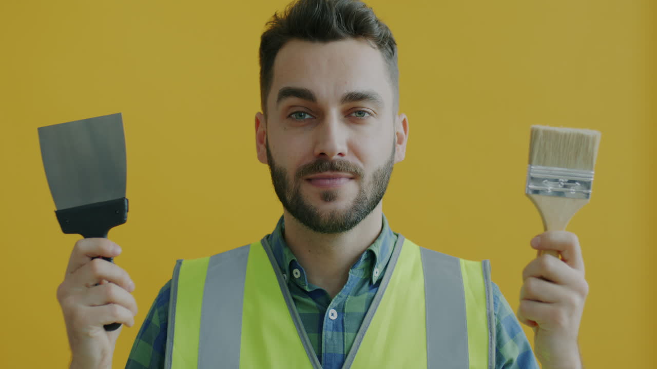 Construction Worker with Painting Supplies