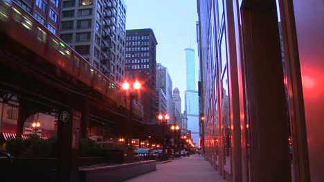 The-El-train-passes-on-an-elevated-platform-at-dusk-in-downtown-Chicago