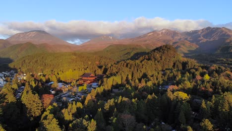 aerial drone over toshogu shrine and mountains in nikko, japan