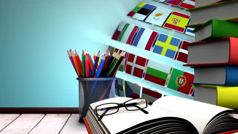 Turning-Multinational-flag-Globe-with-school-supplies-Video