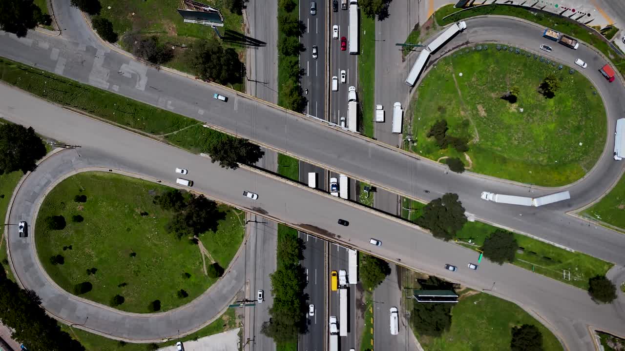 Drone pull-away shot of the highway interchange on the Mexico–Querétaro Highway in the municipality of Cuautitlán Izcalli, part of the Metropolitan Area of Mexico City