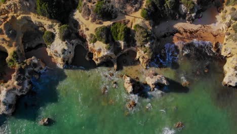 drone shot of the cliffs at the coast in lagos, portugal