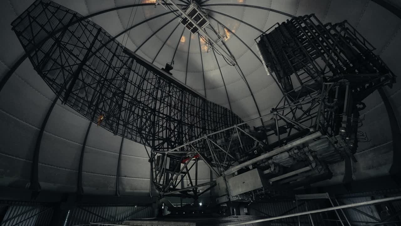 Large Radar Antenna System Inside a Scientific Observatory Dome