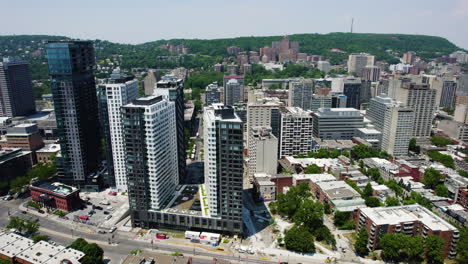 Aerial-tracking-shot-in-front-of-condos-in-the-Shaughnessy-Village,-in-Montreal,-Canada