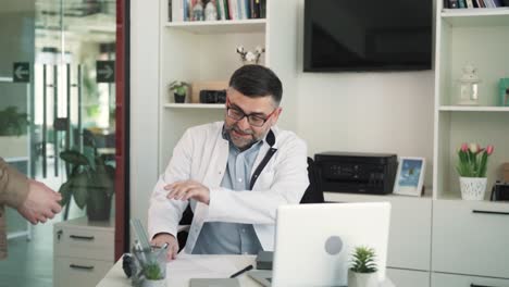 the subordinate brings important papers to their boss, the doctor, which they filled out incorrectly. the doctor-boss is dissatisfied with the work of their subordinate