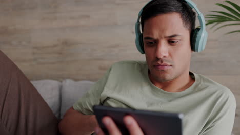 tablet, movie streaming and man with music