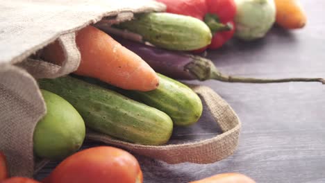 assorted fresh vegetables in a burlap bag