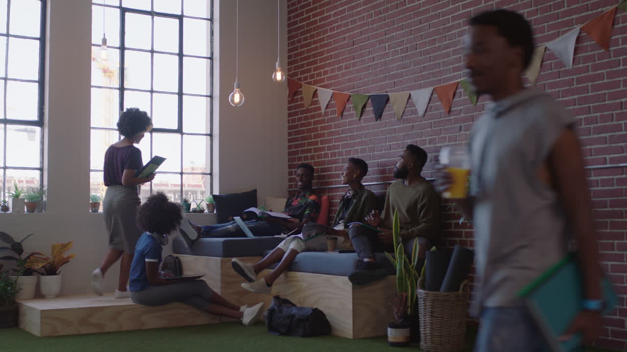 young black business people brainstorming sharing ideas friends working together on creative project colleagues enjoying relaxed office workplace