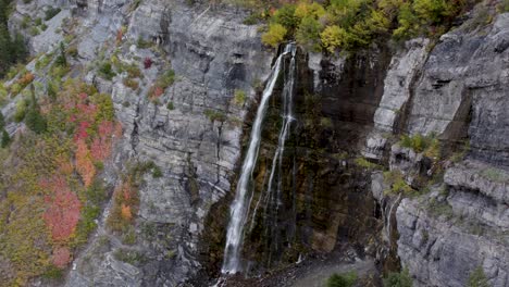 Autumn-Fall-Colors-by-Beautiful-Waterfall-in-Scenic-Utah-Mountains,-Aerial