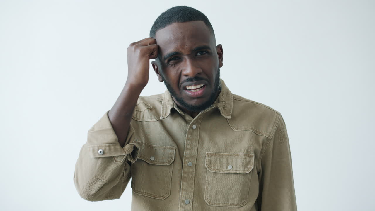 Man expressing frustration and confusion