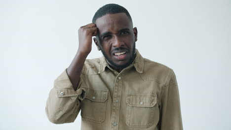 man expressing frustration and confusion