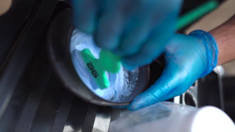 hairdresser preparing the mixture of products to make a hair dye