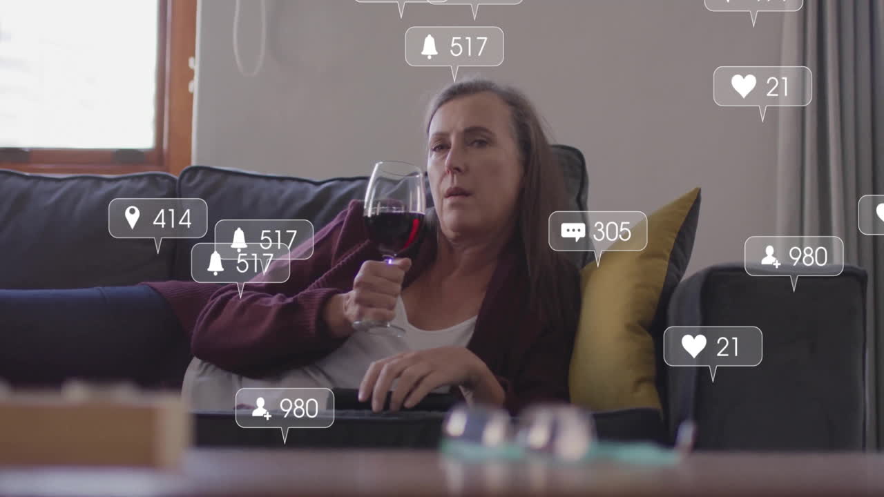 Woman reclining on dark gray sofa, engaging social media marketing with floating notification icons