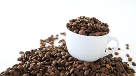 Cup-of-coffee-filled-with-roasted-coffee-beans