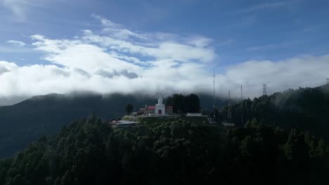 wide drone aerial view of the monserrate hill park church in bogotá, colombia