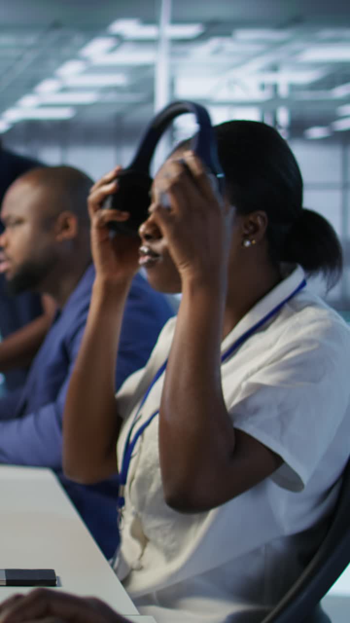 Vertical video Focus on server hub employee developing disaster recovery plans