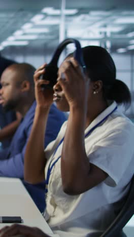vertical video focus on server hub employee developing disaster recovery plans