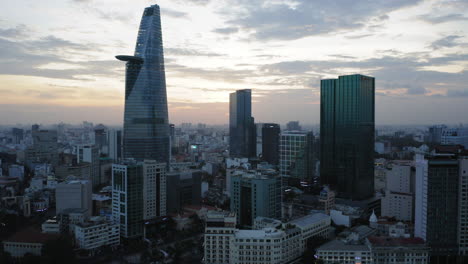 aerial view of ho chi minh, skyscrapers and river views at sunset