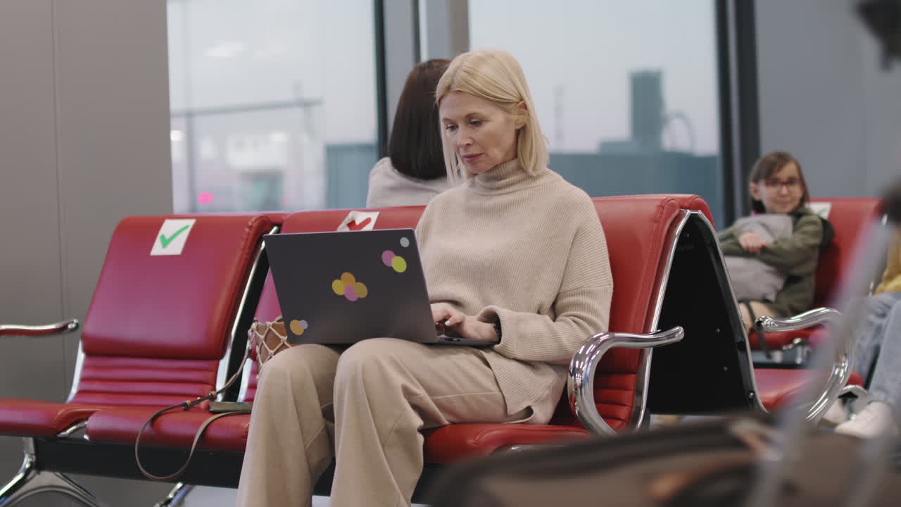 Woman Waiting In Departure Lounge