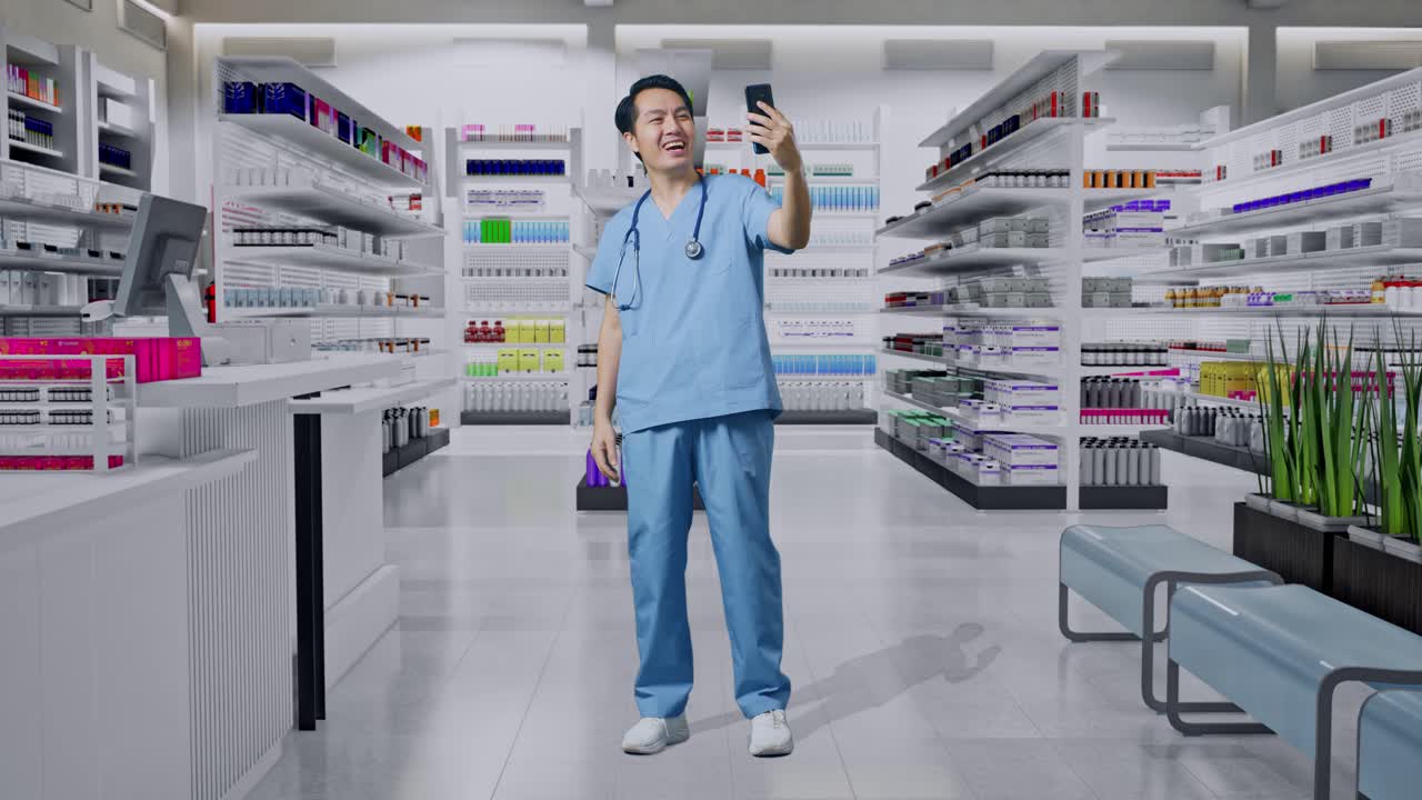 스테토스코프를 들고 있는 아시아 남성 의사의 몸이 가득 차 있고, 손을 흔들고 약국에 서서 스마트폰으로 비디오 통화를 하고 있습니다.