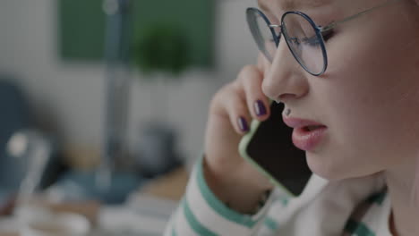 woman on phone call in modern office