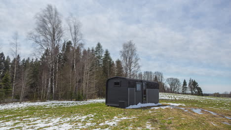 trailer or tiny home time lapse from winter through all the seasons in a loop