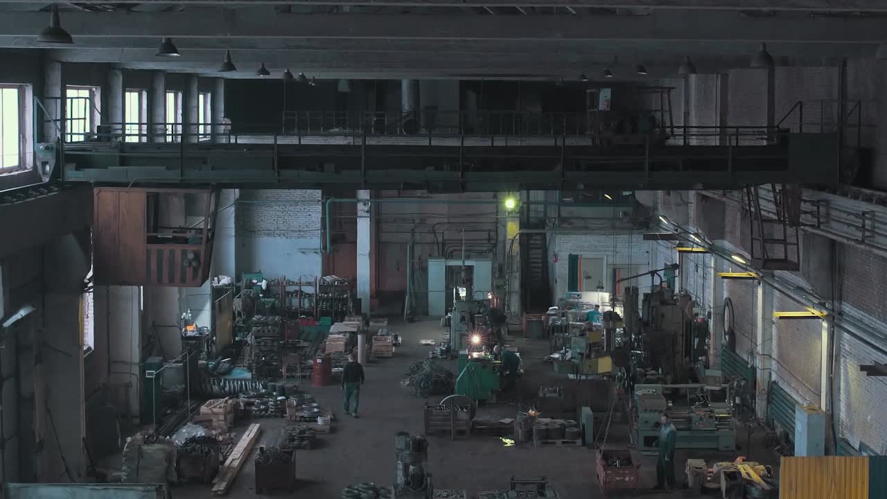 Large Industrial Factory Interior with Workers