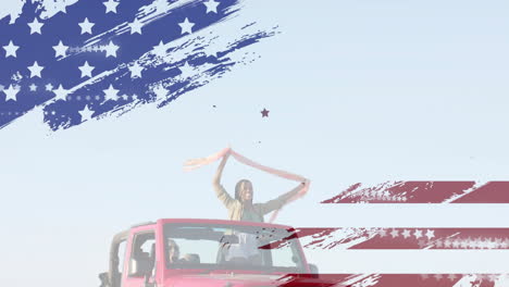 animation of flag of usa over happy diverse women in car by beach in summer