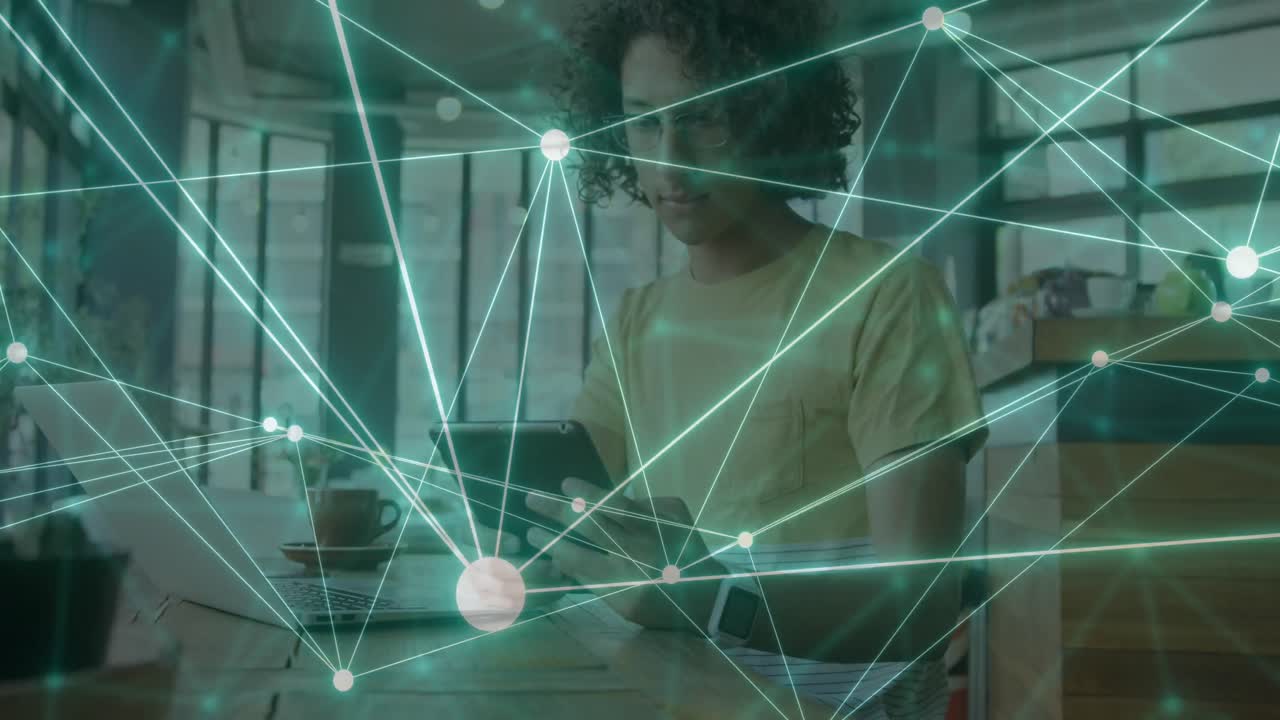 animación de una red de conexiones sobre un hombre biracial usando una tableta