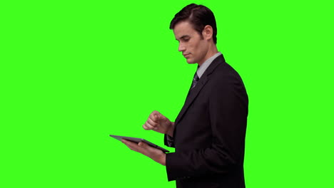 Businessman-using-his-digital-tablet