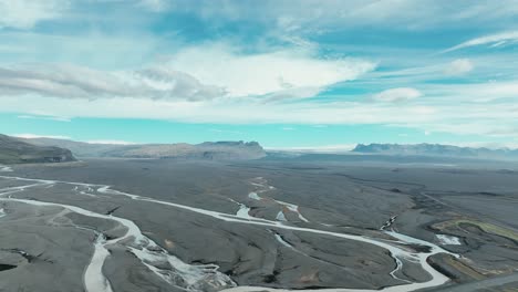 aerial view of river flowing through lava field near vatnajokull glacier in south iceland