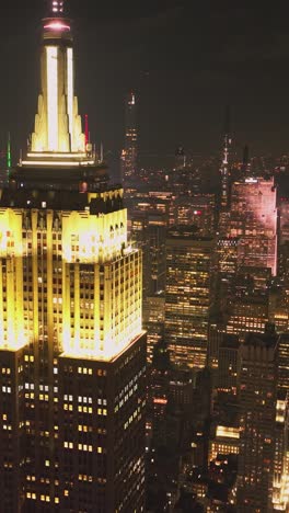 manhattan skyline at night with flashing city lights
