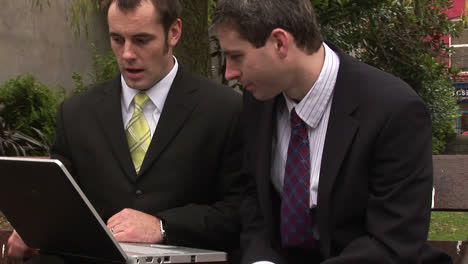 two men businessmen working as a team