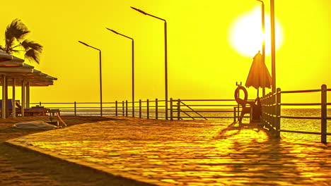 Timelapse-of-Ship-Anchoring-at-sunset-with-orange-sun-in-Hurghada,-Egypt