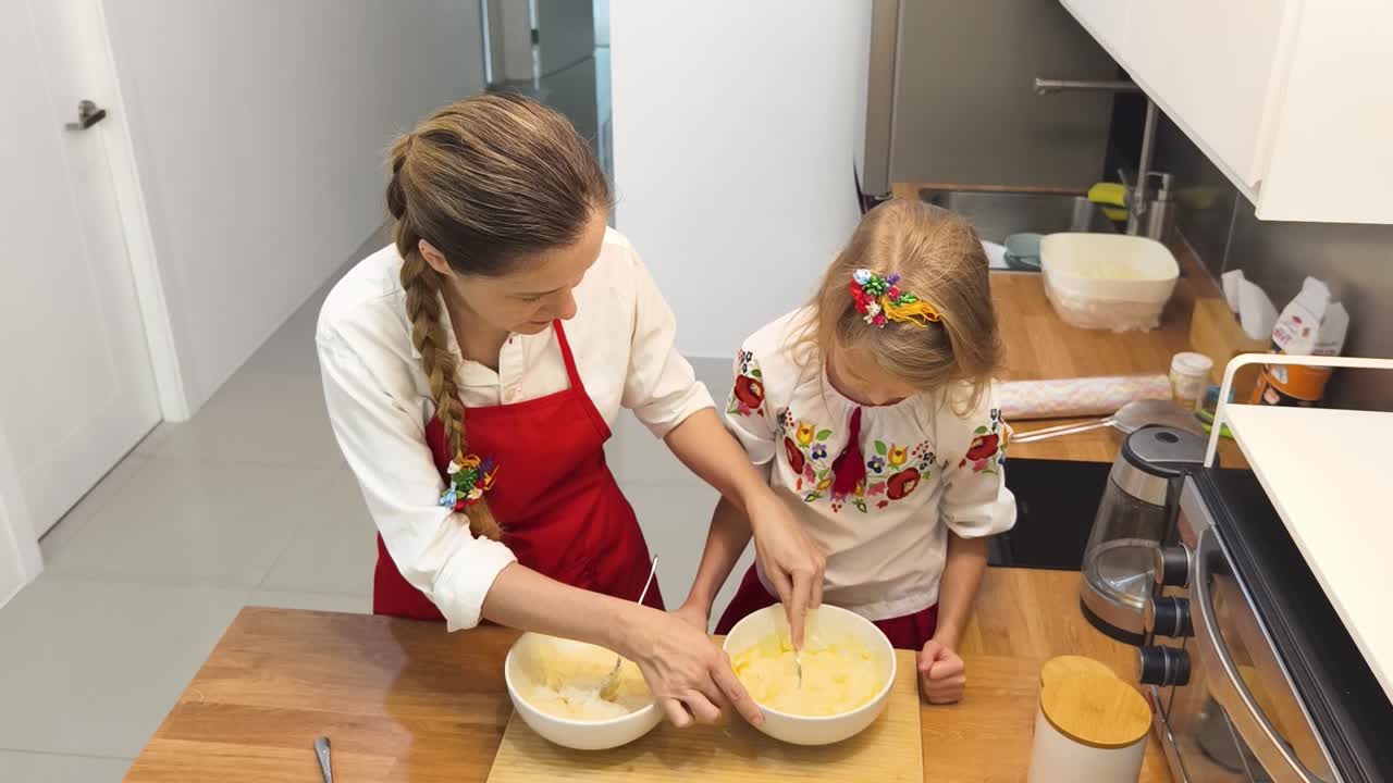 Mother and Daughter Baking Together