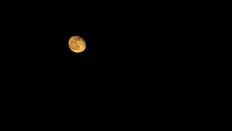 Third-Quarter-Moon-Sitting-In-The-Top-Left-Of-Frame