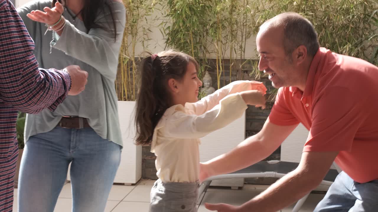 Woman with daughter arriving at the house of her grandparents