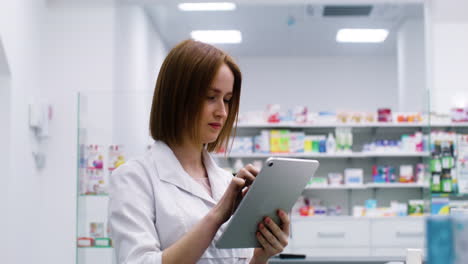 young woman using tablet indoors