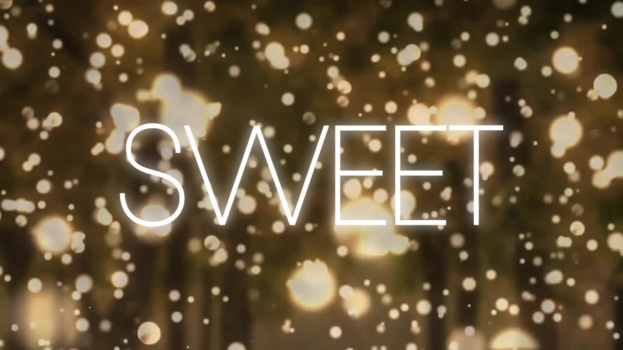 검은 바탕에 밝은 반점 위에 달한 텍스트의 애니메이션