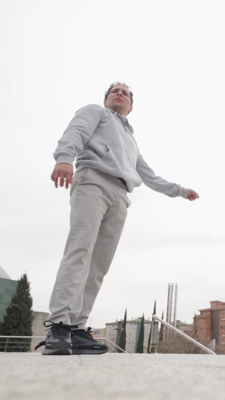 Parkour athlete performing acrobatics in urban environment