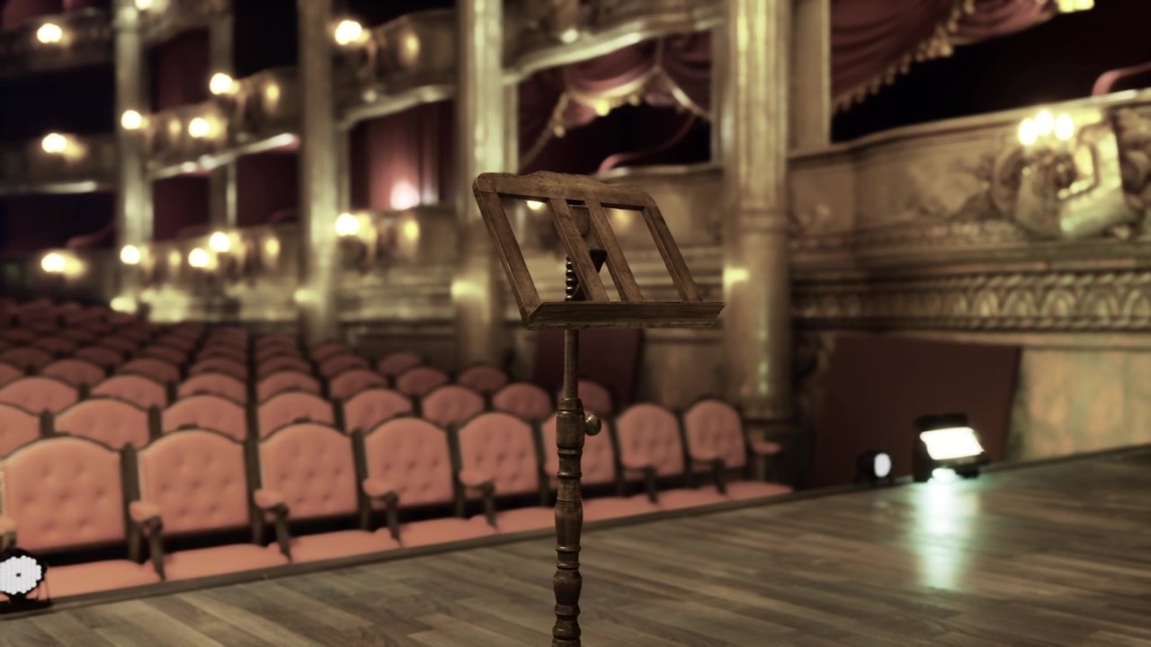 Elegante teatro dell'opera con decorazioni dorate e tappezzeria sontuosa